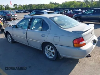 1999 Nissan Altima XE with VIN 1N4DL01D4XC252973, listed as a IAAI auction lot 42005504 with 247,570 mi miles. Bid and sale history available at carsss.com. Image 3.