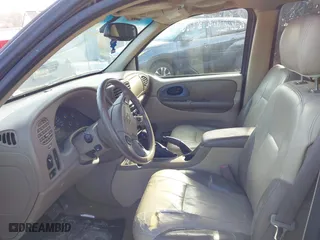 2004 Chevrolet TrailBlazer LS with VIN 1GNDT13S742304861, listed as a IAAI auction lot 41597648 with 126,526 mi miles. Bid and sale history available at carsss.com. Image 5.