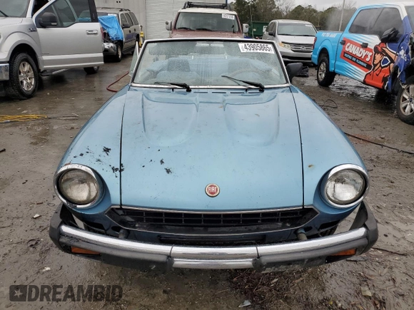 1979 FIAT 124 Spider z VIN 124CS20146364, wystawiony jako Copart lot #43905865 z przebiegiem 46 341 mil mil oraz Szkoda całkowita • Salvage title. Historia ofert i sprzedaży dostępna na DreamBid. Obrazek 5.