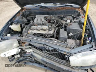 1994 Toyota Camry LE z VIN JT2GK12E2R0039606, wystawiony jako Copart lot #49840015 z przebiegiem 197 834 mil mil oraz Szkoda całkowita • Salvage title. Historia ofert i sprzedaży dostępna na DreamBid. Obrazek 11.