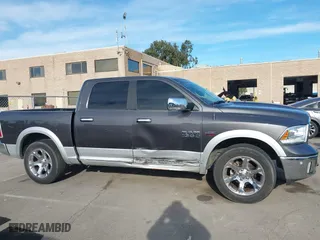 2017 Ram 1500 Laramie with VIN 1C6RR7NT2HS815929, listed as a IAAI auction lot 41277743 with 98,739 mi miles. Bid and sale history available at carsss.com. Image 13.