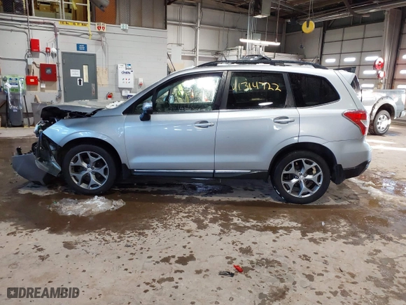 2015 Subaru Forester 2.5i Touring with VIN JF2SJAUCXFH471892, listed as a IAAI auction lot 41314722 with 94,717 mi miles. Bid and sale history available at carsss.com. Image 14.