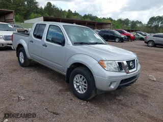 2015 Nissan Frontier SV with VIN 1N6AD0EV9FN764953, listed as a IAAI auction lot 41934108 with 148,887 mi miles. Bid and sale history available at carsss.com. Image 1.