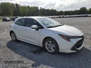 2021 Toyota Corolla Hatchback SE with VIN JTNB4MBE3M3131954, listed as a Copart auction lot 69966354 with 26,789 mi miles and Salvage Title. Bid and sale history available at carsss.com. Image 4.