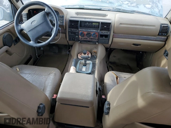 1997 Land Rover Discovery SD z VIN SALJY1249VA705067, wystawiony jako Copart lot #77047054 z przebiegiem 146 965 mil mil oraz Czysty tytuł • Clean title. Historia ofert i sprzedaży dostępna na DreamBid. Obrazek 8.
