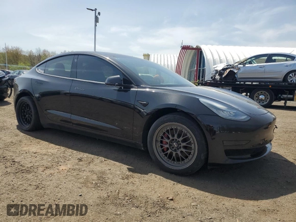 2018 Tesla Model 3 Long Range Battery with VIN 5YJ3E1EB9JF068279, listed as a Copart auction lot 54244155 with 126,279 mi miles and Clean Title. Bid and sale history available at DreamBid. Image 4.