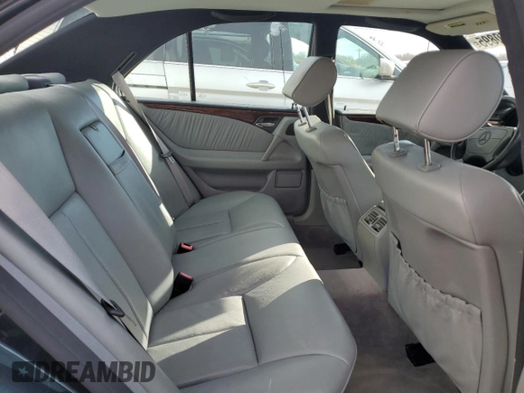 1997 Mercedes-Benz E-Class with VIN WDBJF72F8VA462335, listed as a Copart auction lot 50230895 with 97,831 mi miles and Salvage Title. Bid and sale history available at carsss.com. Image 10.