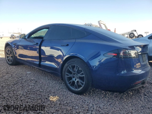 2023 Tesla Model S with VIN 5YJSA1E57PF498760, listed as a Copart auction lot 88494905 with 39,521 mi miles and Salvage title. Bid and sale history available at DreamBid. Image 2.