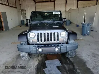 2017 Jeep Wrangler Sahara z VIN 1C4AJWBG6HL582839, wystawiony jako Copart lot #52049725 z przebiegiem 143 544 mil mil oraz Szkoda całkowita • Salvage title. Historia ofert i sprzedaży dostępna na DreamBid. Obrazek 11.