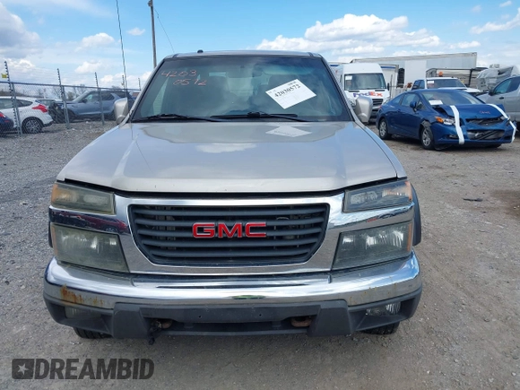 2009 GMC Canyon SLE1 z VIN 1GTDT13E398100890, wystawiony jako IAAI lot #42030572 z przebiegiem 160 181 mil mil oraz . Historia ofert i sprzedaży dostępna na DreamBid. Obrazek 12.