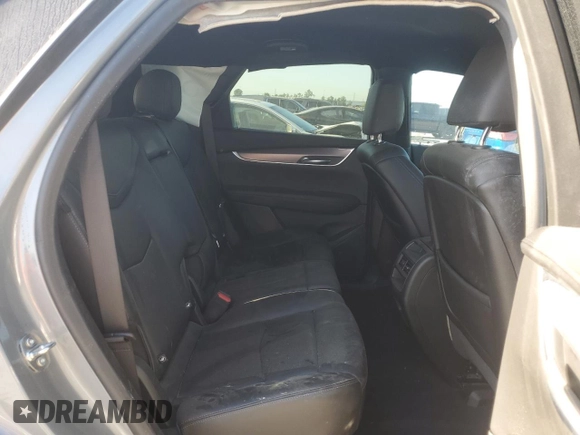 2023 Cadillac XT5 FWD Luxury z VIN 1GYKNAR49PZ174591, wystawiony jako Copart lot #52144985 z przebiegiem 20 005 mil mil oraz Szkoda całkowita • Salvage title. Historia ofert i sprzedaży dostępna na DreamBid. Obrazek 11.