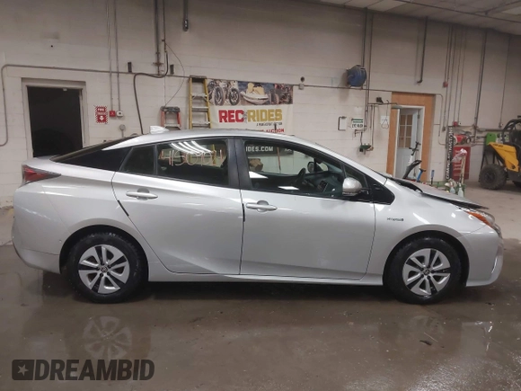 2017 Toyota Prius Two z VIN JTDKARFU1H3037959, wystawiony jako IAAI lot #41509021 z przebiegiem 82 500 mil mil oraz . Historia ofert i sprzedaży dostępna na DreamBid. Obrazek 14.