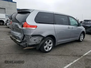 2012 Toyota Sienna with VIN 5TDKA3DC4CS014867, listed as a Copart auction lot 43191655 with 169,517 mi miles and Salvage Title. Bid and sale history available at DreamBid. Image 3.