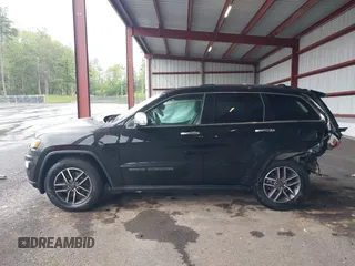 2021 Jeep Grand Cherokee Limited with VIN 1C4RJFBG2MC754779, listed as a IAAI auction lot 42293110 with 64,821 mi miles and . Bid and sale history available at DreamBid. Image 14.