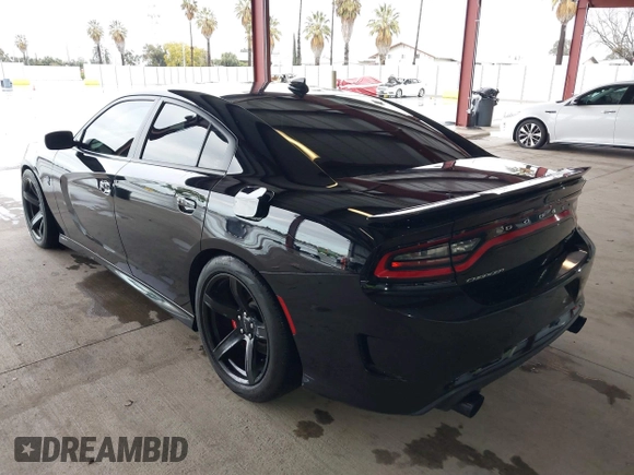 2019 Dodge Charger SRT Hellcat with VIN 2C3CDXL97KH552439, listed as a IAAI auction lot 41813879 with 58,921 mi miles and . Bid and sale history available at DreamBid. Image 3.