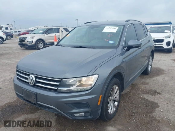2018 Volkswagen Tiguan SEL with VIN 3VV3B7AX3JM000585, listed as a IAAI auction lot 41905836 with 99,114 mi miles and . Bid and sale history available at DreamBid. Image 6.