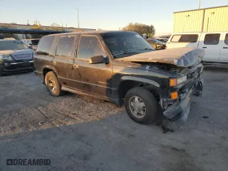 2000 Chevrolet Tahoe Limited with VIN 1GNEC13R5YR162329, listed as a Copart auction lot 84117434 with 177,241 mi miles and Salvage Title. Bid and sale history available at carsss.com. Image 4.