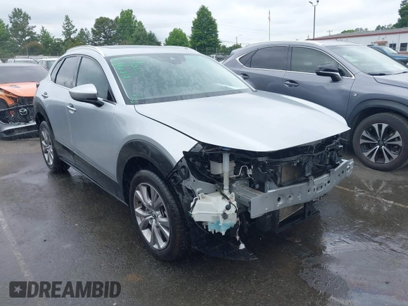 2021 Mazda CX-30 Premium with VIN 3MVDMADL7MM252507, listed as a IAAI auction lot 42338625 with 44,537 mi miles and . Bid and sale history available at DreamBid. Image 1.