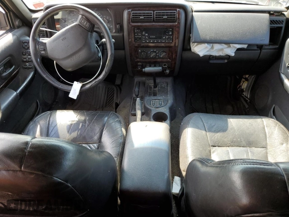 2000 Jeep Cherokee Limited with VIN 1J4FF68S4YL260990, listed as a Copart auction lot 70560674 with 265,934 mi miles and Non Repairable. Bid and sale history available at carsss.com. Image 8.