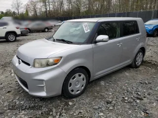 2014 Scion xB with VIN JTLZE4FE0EJ049899, listed as a Copart auction lot 52962125 with 120,791 mi miles and Salvage Title. Bid and sale history available at carsss.com. Image 1.