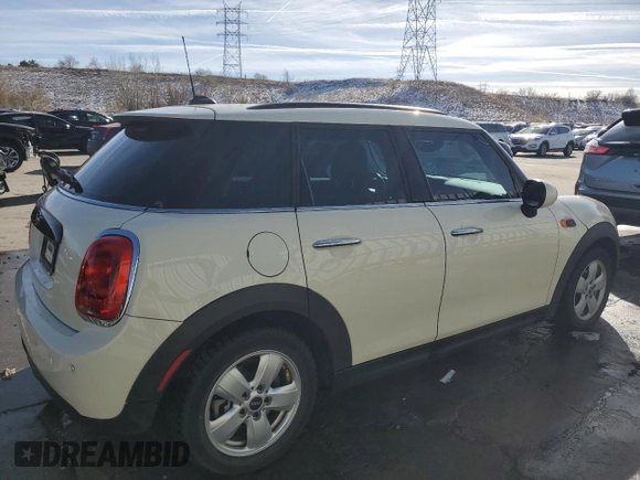 2019 MINI Hardtop 4 Door Cooper with VIN WMWXU1C57K2J01914, listed as a Copart auction lot 84330304 with 43,399 mi miles and Salvage Title. Bid and sale history available at DreamBid. Image 3.