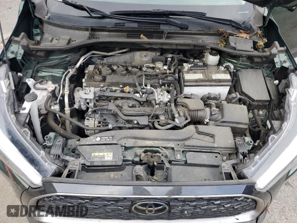 2023 Toyota Corolla Cross XLE с VIN 7MUDAAAG4PV038098, выставлен на аукционе Copart как лот 57906915 с пробегом 73 569 миль миль и Списание • Salvage title. История ставок и продаж доступна на DreamBid. Изображение 12.