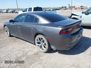 2015 Dodge Charger SXT with VIN 2C3CDXHG9FH825135, listed as a IAAI auction lot 42172793 with 169,324 mi miles and . Bid and sale history available at DreamBid. Image 3.