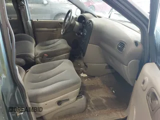 2003 Dodge Caravan SE with VIN 1D4GP24313B191319, listed as a IAAI auction lot 41398477 with 220,083 mi miles. Bid and sale history available at carsss.com. Image 5.