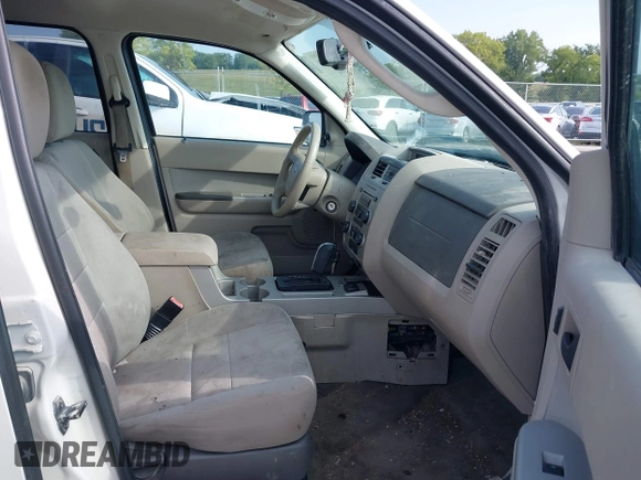 2010 Ford Escape Hybrid z VIN 1FMCU5K31AKD22069, wystawiony jako IAAI lot #40151027 z przebiegiem 185 932 mil mil oraz . Historia ofert i sprzedaży dostępna na DreamBid. Obrazek 5.