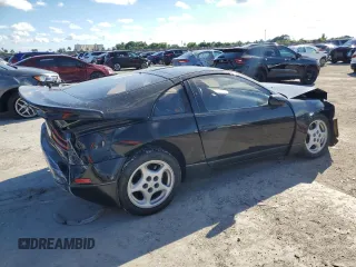 1990 Nissan 300ZX z VIN JN1CZ24A8LX006855, wystawiony jako Copart lot #73952854 z przebiegiem 74 547 mil mil oraz Szkody całkowita. Historia ofert i sprzedaży dostępna na DreamBid. Obrazek 3.
