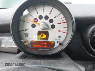 2013 MINI Hardtop S z VIN WMWSV3C50DT397035, wystawiony jako IAAI lot #42386524 z przebiegiem 145 465 mil mil oraz . Historia ofert i sprzedaży dostępna na DreamBid. Obrazek 7.