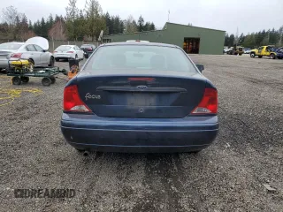 2002 Ford Focus LX with VIN 1FAFP33P12W113185, listed as a Copart auction lot 48554805 with 117,769 mi miles and Salvage Title. Bid and sale history available at DreamBid. Image 6.