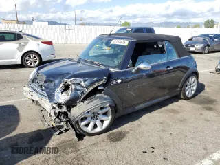 2006 MINI Convertible S with VIN WMWRH33536TK59272, listed as a Copart auction lot 51144475 with 46,024 mi miles and Salvage Title. Bid and sale history available at DreamBid. Image 1.