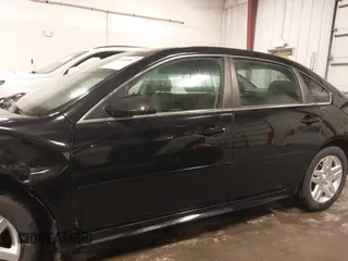 2014 Chevrolet Impala LT with VIN 2G1WB5E32E1127731, listed as a IAAI auction lot 42018987 with 163,649 mi miles and . Bid and sale history available at DreamBid. Image 14.