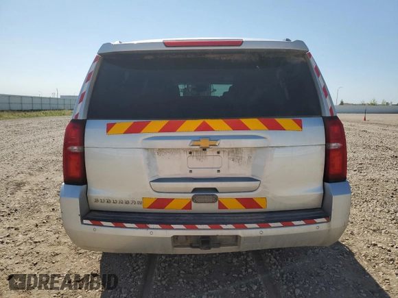 2020 Chevrolet Suburban LT z VIN 1GNSKHKC0LR285945, wystawiony jako Copart lot #56207225 z przebiegiem 208 281 mil mil oraz Czysty tytuł • Clean title. Historia ofert i sprzedaży dostępna na DreamBid. Obrazek 6.