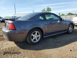 2004 Ford Mustang Standard z VIN 1FAFP40654F138305, wystawiony jako Copart lot #65882195 z przebiegiem 89 404 mil mil oraz Czysty tytuł • Clean title. Historia ofert i sprzedaży dostępna na DreamBid. Obrazek 3.