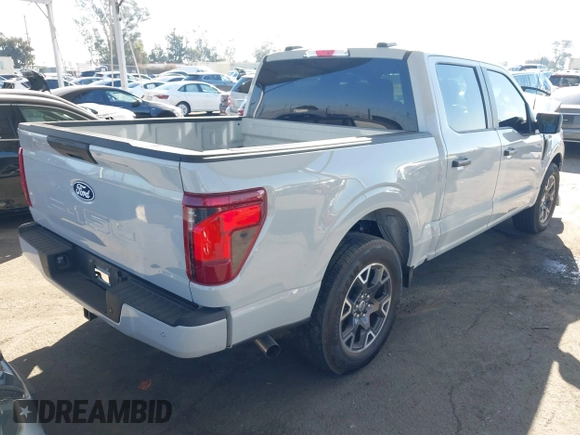 2024 Ford F-150 STX with VIN 1FTEW2KP7RFA29709, listed as a IAAI auction lot 41311395 with 5,883 mi miles and . Bid and sale history available at carsss.com. Image 4.