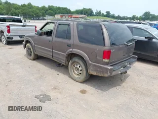 1999 Oldsmobile Bravada z VIN 1GHDT13W3X2710047, wystawiony jako IAAI lot #42481978 z przebiegiem Nie podano mil oraz . Historia ofert i sprzedaży dostępna na DreamBid. Obrazek 3.