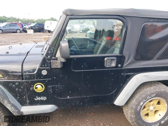 2006 Jeep Wrangler Sport z VIN 1J4FA49S06P721223, wystawiony jako IAAI lot #42654272 z przebiegiem 225 223 mil mil oraz . Historia ofert i sprzedaży dostępna na DreamBid. Obrazek 14.