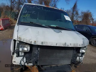 2004 GMC Savana Cargo Van with VIN 1GTHG35U541132912, listed as a IAAI auction lot 41539124 with 367,102 mi miles. Bid and sale history available at carsss.com. Image 12.