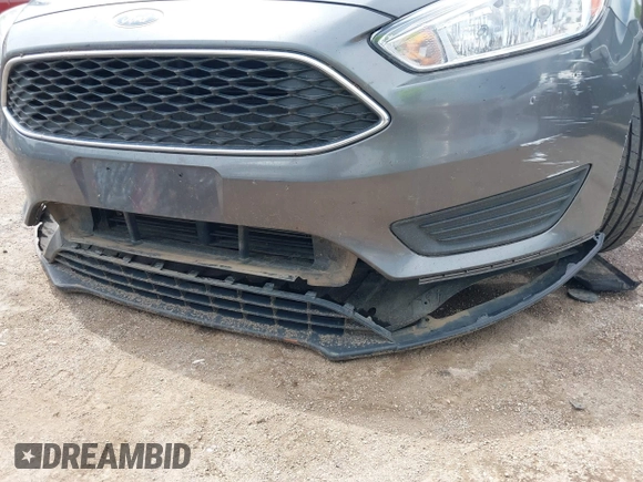 2018 Ford Focus SE with VIN 1FADP3F20JL312395, listed as a IAAI auction lot 42110335 with 110,720 mi miles and . Bid and sale history available at DreamBid. Image 6.