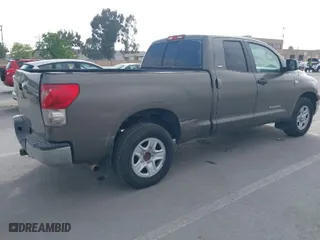 2007 Toyota Tundra SR5 with VIN 5TFRT54137X007329, listed as a IAAI auction lot 42067898 with 365,506 mi miles. Bid and sale history available at carsss.com. Image 4.