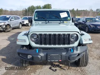 2024 Jeep Wrangler Sport S with VIN 1C4RJXN65RW166079, listed as a IAAI auction lot 41795439 with 14,937 mi miles and . Bid and sale history available at DreamBid. Image 12.