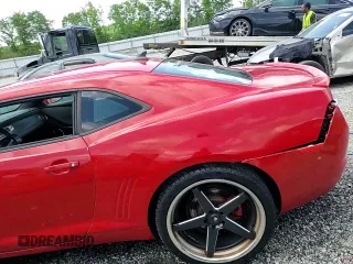 2013 Chevrolet Camaro LS с VIN 2G1FA1E39D9158986, выставлен на аукционе Copart как лот 56353335 с пробегом 147 948 миль миль и Списание • Salvage title. История ставок и продаж доступна на DreamBid. Изображение 13.