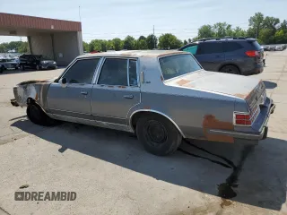 1986 Pontiac Bonneville Brougham z VIN 2G2GR69H9G2241181, wystawiony jako Copart lot #68122684 z przebiegiem Nie podano mil oraz Nie do naprawy • Non repairable. Historia ofert i sprzedaży dostępna na DreamBid. Obrazek 2.