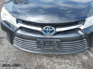 2015 Toyota Camry Hybrid LE with VIN 4T1BD1FK3FU164092, listed as a IAAI auction lot 41886726 with 396,189 mi miles. Bid and sale history available at carsss.com. Image 6.