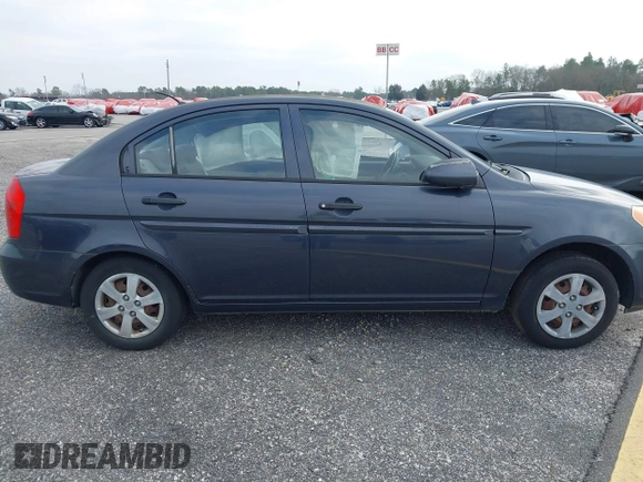 2008 Hyundai Accent GLS with VIN KMHCN46C58U212366, listed as a IAAI auction lot 40748865 with 99,077 mi miles. Bid and sale history available at carsss.com. Image 13.
