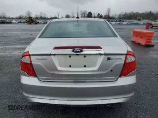2010 Ford Fusion Hybrid z VIN 3FADP0L30AR122805, wystawiony jako Copart lot #52276255 z przebiegiem 146 073 mil mil oraz Szkoda całkowita • Salvage title. Historia ofert i sprzedaży dostępna na DreamBid. Obrazek 6.