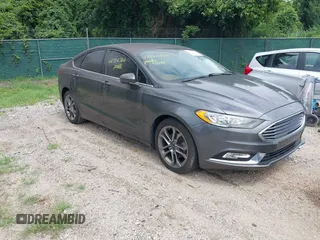 2017 Ford Fusion SE with VIN 3FA6P0HD1HR203168, listed as a IAAI auction lot 42786766 with 124,763 mi miles and . Bid and sale history available at DreamBid. Image 1.