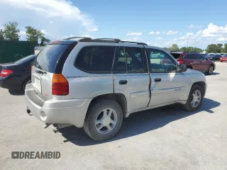 2004 GMC Envoy SLT с VIN 1GKDS13S542129977, выставлен на аукционе Copart как лот 61170465 с пробегом 129 897 миль миль и Списание • Salvage title. История ставок и продаж доступна на DreamBid. Изображение 3.